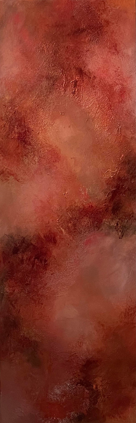 Abstract texture with warm tones of red, orange, and brown.