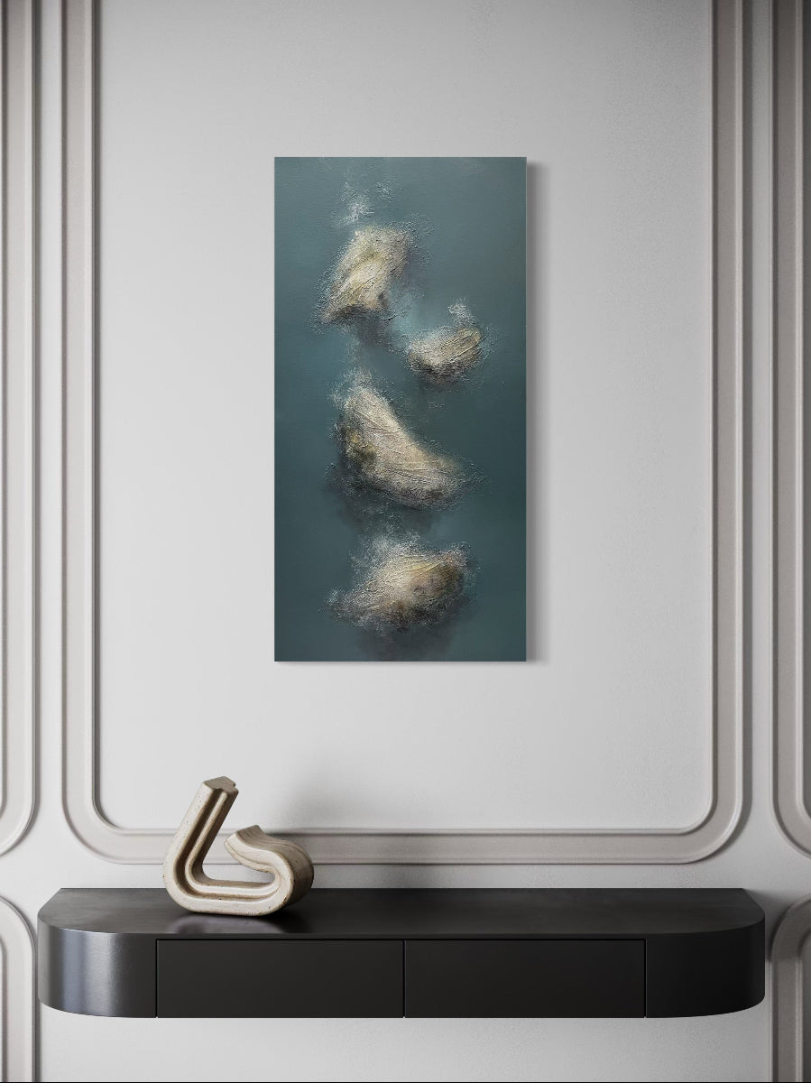 Abstract art piece on a wall above a black console table with decorative items.