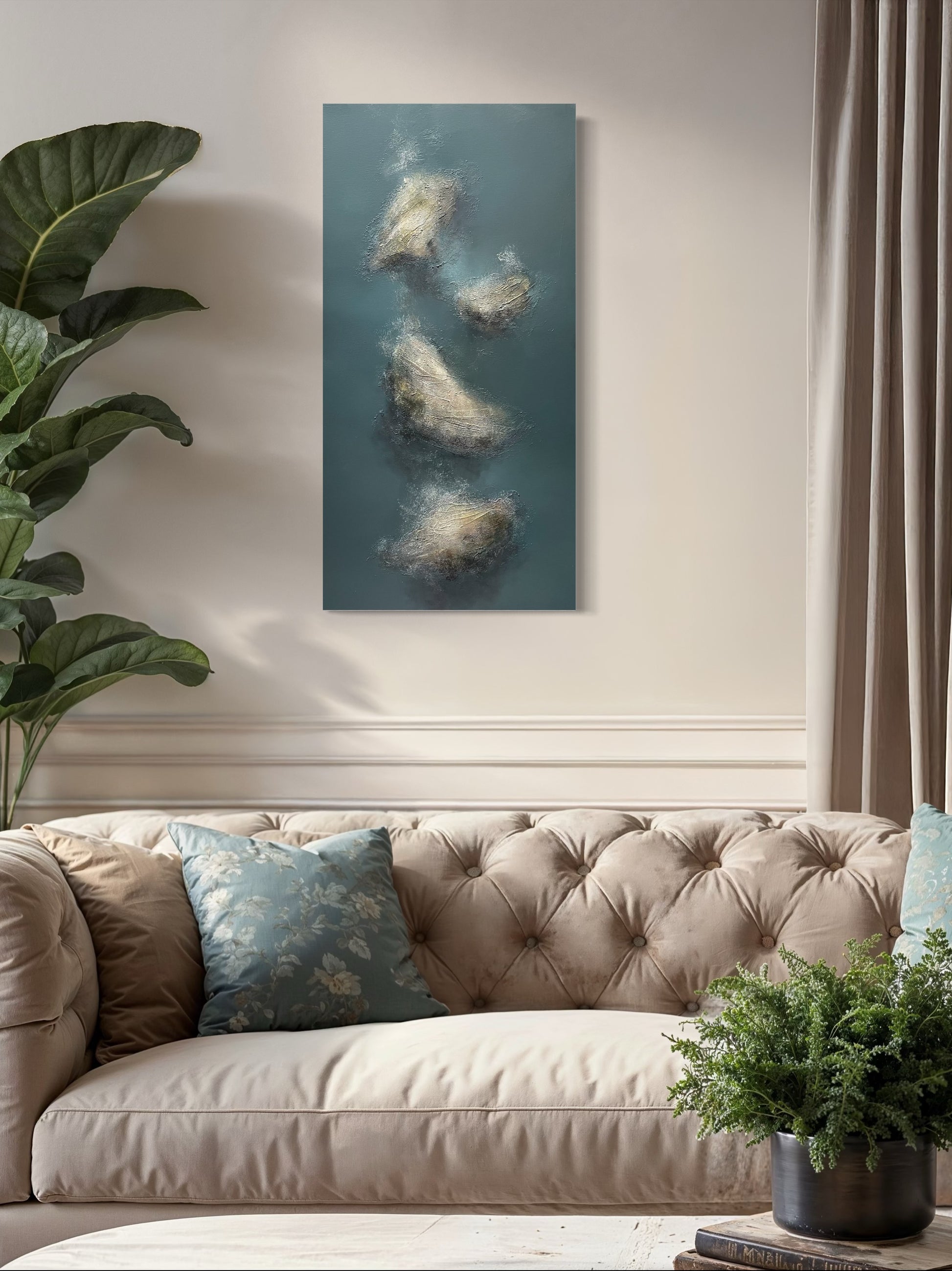 Living room with a beige sofa, decorative pillows, and a wall art piece.